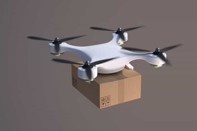 Quadcopter drone carrying parcel